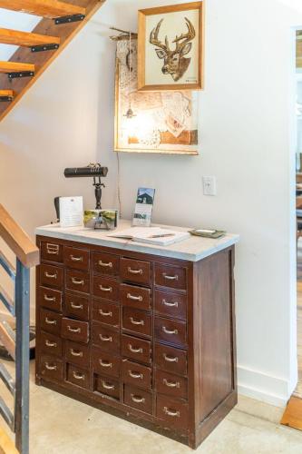 a wooden desk in the corner of a room at Away in the County-Sandbanks Pec in Cherry Valley