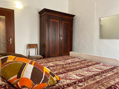 Ένα ή περισσότερα κρεβάτια σε δωμάτιο στο Casa del Ciliegio