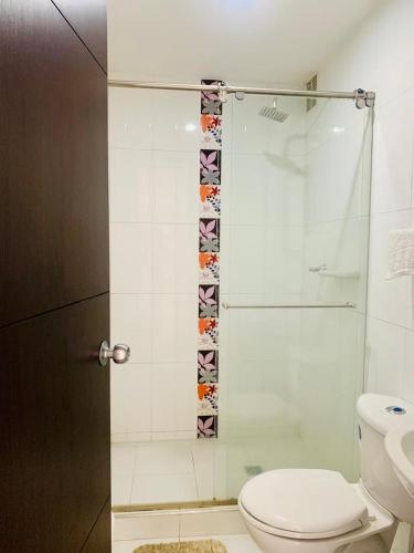 Ένα μπάνιο στο Apartamento Merecure