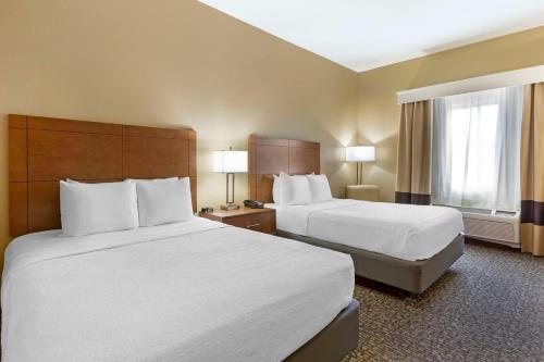 Ένα ή περισσότερα κρεβάτια σε δωμάτιο στο Best Western Plus Surprise-Phoenix NW