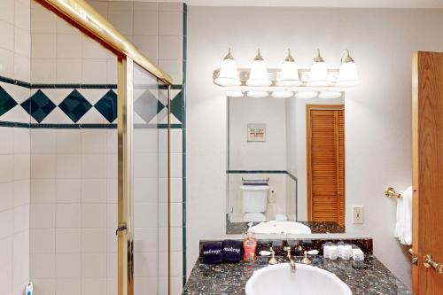 a bathroom with a sink and a mirror at Dry Creek Haven in Healdsburg