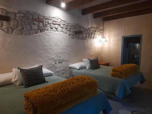 Postel nebo postele na pokoji v ubytování Hotel Pepen