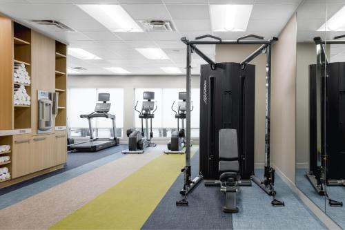 a gym with treadmills and elliptical machines at TownePlace Suites by Marriott Chattanooga South, East Ridge in Chattanooga