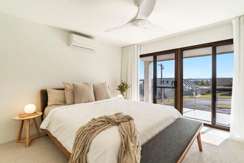 Postel nebo postele na pokoji v ubytování Talinga 2 - Sunset Views