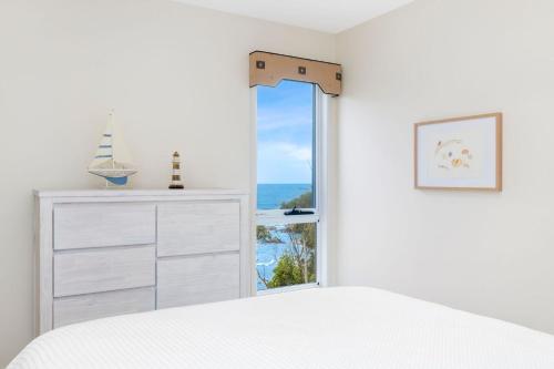 Postel nebo postele na pokoji v ubytování Tollgate Beach House