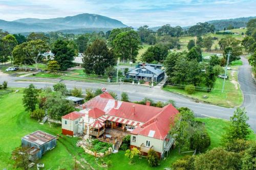 an aerial view of a house with a red roof at Robbie Burns Hotel Wyndham in Burragate