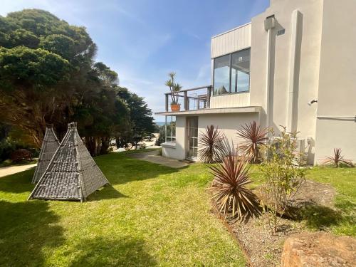 a house with a pyramid in the yard at BIG4 Wye River Holiday Park in Wye River