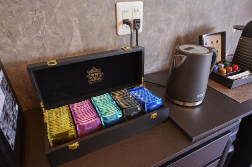 a box of bangles sitting on top of a desk at IZA高島 minato in Imazu