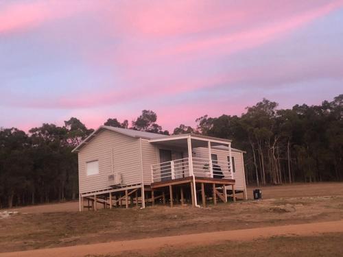 a house on the side of a field at Las Casitas in Donnybrook