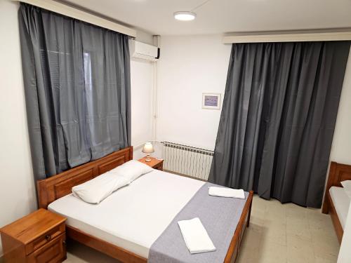 Postel nebo postele na pokoji v ubytování Bravo Plus