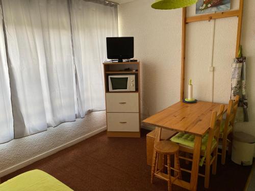 Photo de la galerie de l'établissement Jolie appartement 4 couchages, à Puy-Saint-Vincent