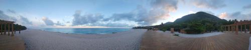 a rendering of a beach with the ocean and a mountain at Villa Tesoros del Mar - Luxury Beachfront Villa with Natural Pool, Jacuzzi, Mountain Views, Yoga, BBQ, Wi-Fi, Pet & Family Friendly, Barahona Adventures in El Arroyo