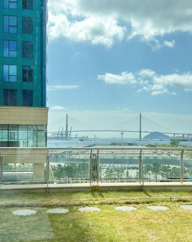a view of a city from the roof of a building at Brown Suites Busan Station in Busan