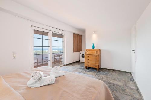 Ένα ή περισσότερα κρεβάτια σε δωμάτιο στο Selena Seaview Villa
