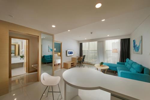 Μια τηλεόραση ή/και κέντρο ψυχαγωγίας στο Holiday Inn Express Luoyang Yichuan by IHG