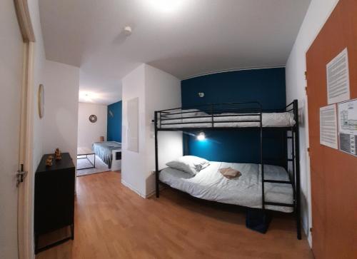 Katil atau katil-katil dalam bilik di Appartement de la Marmotte Cendrée, dans résidence de tourisme 3 étoiles