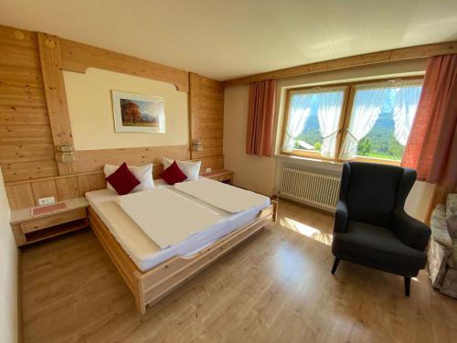 Postel nebo postele na pokoji v ubytování Adlerhof am Sonnenplateau