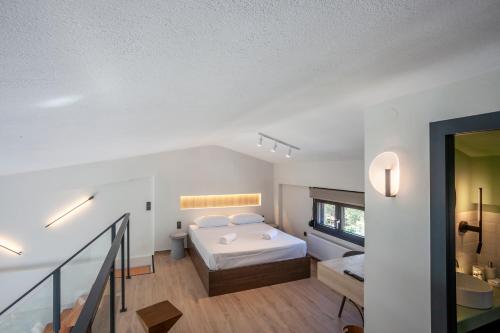 Postel nebo postele na pokoji v ubytování Thalos Luxury Living I
