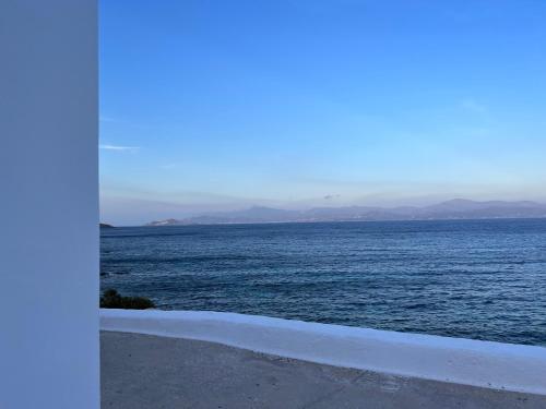 a view of a large body of water at CAELI PAROS by Kostas & Joanna Studios in Logaras