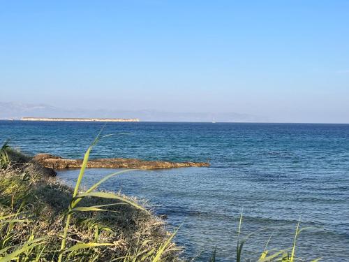a view of a large body of water at CAELI PAROS by Kostas & Joanna Studios in Logaras