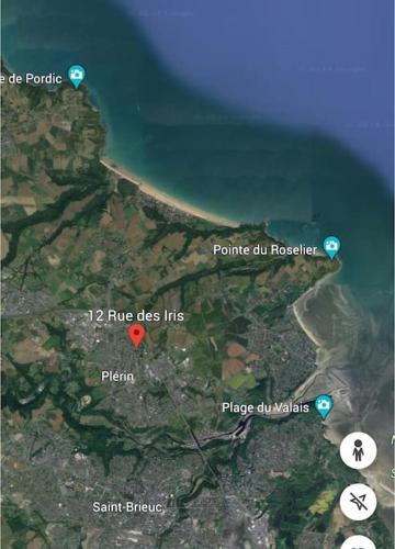 a map of a beach with a red heart at Gite Au Charme des Iris in Plérin