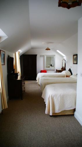 Postel nebo postele na pokoji v ubytování Rockville House B&B
