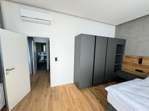 Postel nebo postele na pokoji v ubytování Jan Maria Hotel