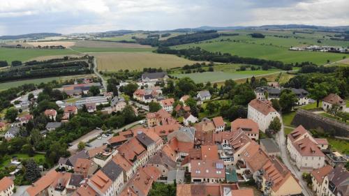 an aerial view of a town with red roofs at Ferienwohnung Gräfin Cosel in Stolpen