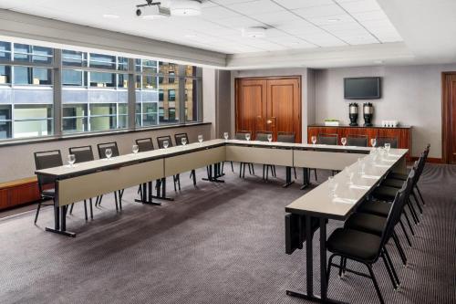 a conference room with a long table and chairs at Residence Inn by Marriott New York Manhattan/Times Square in New York