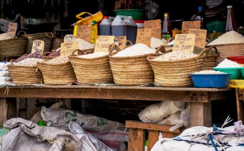 a table with baskets and other items on it at Mahali Zanzibar in Paje