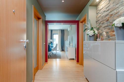 a corridor of a room with a hallway at Meu Sonho in Sesimbra