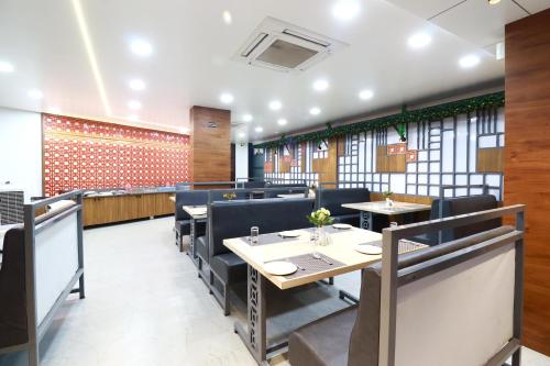 Χώρος καθιστικού στο Hotel Lémore Stay & Dine
