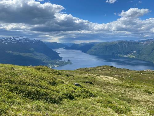 a view of a lake from a mountain at Naustloftet in Hornindal