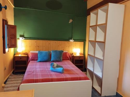 Postel nebo postele na pokoji v ubytování CR familiar PrimaVera Jarandilla de la Vera