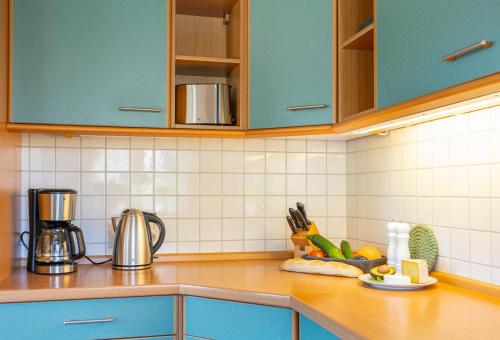 Dapur atau dapur kecil di Reetdachhaus Stavanger