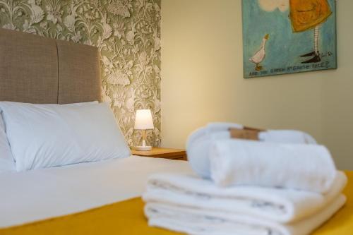 Katil atau katil-katil dalam bilik di Rocklands Lodges