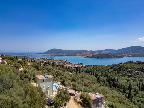 an aerial view of a town and a lake at Koumaries Villas in Lygia