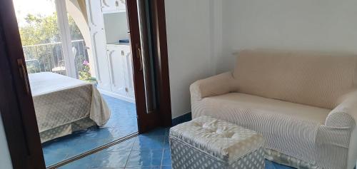 Postel nebo postele na pokoji v ubytování Albergo La Conca Azzurra