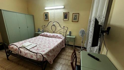 Ein Bett oder Betten in einem Zimmer der Unterkunft Albergo Fiorita