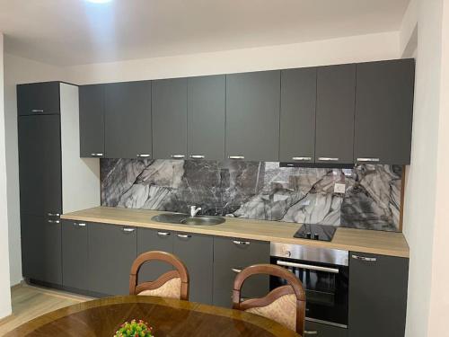 Η κουζίνα ή μικρή κουζίνα στο Ardi Apartaments 2
