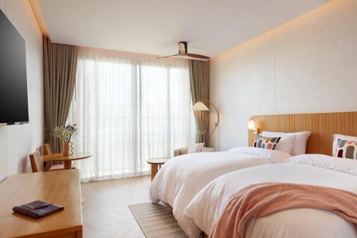 Cama o camas de una habitación en Marasca Samui - Small Luxury Hotels of the World