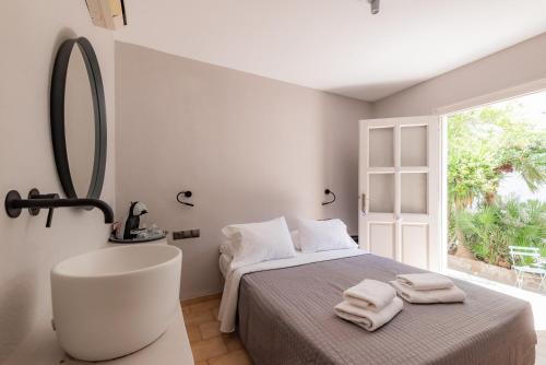 Posteľ alebo postele v izbe v ubytovaní Rania Apartments Sea View