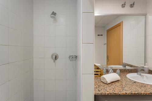 Kúpeľňa v ubytovaní Apartments Sata Olimpic Village Area