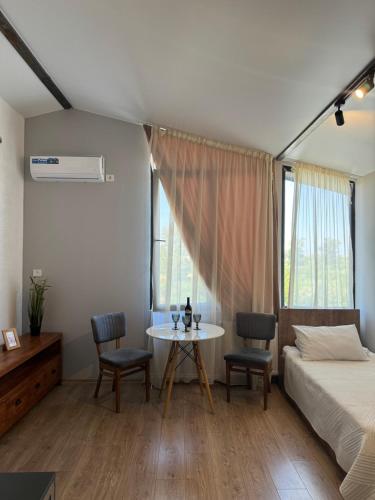Postel nebo postele na pokoji v ubytování Guest House Elene