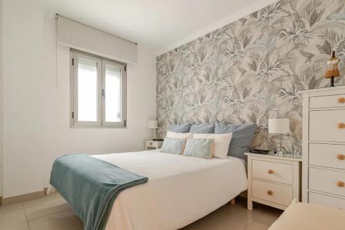 Posteľ alebo postele v izbe v ubytovaní Apartamento Vera Canteras