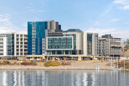 a group of buildings next to a body of water at Hotel Indigo Vancouver Dwtn - Portland Area by IHG in Vancouver