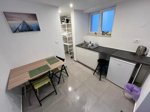 X Boutique Marinac Studio Apartments & Rooms