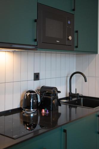 Dapur atau dapur kecil di Qstay Gratus Tbilisi