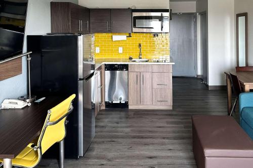 a kitchen with a sink and a counter top at MainStay Suites Conover-Hickory in Conover