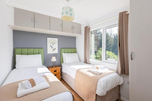 Katil atau katil-katil dalam bilik di Rocklands Lodges